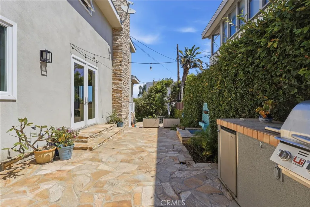 Side patio off kitchen and living room makes entertaining so easy! BBQ, fountain, firepit all add to the appeal! Side patio off kitchen and living room makes entertaining so easy! BBQ, fountain, firepit all add to the appeal!