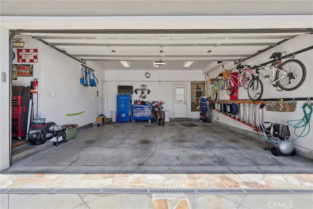 Over-sized, direct-access garage with a door to the patio as well. Over-sized, direct-access garage with a door to the patio as well.