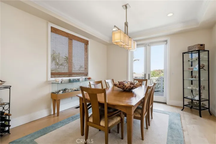 Formal dining room with doors to deck.