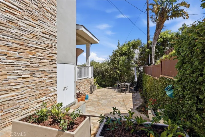 Lower patio - great space for lounging and entertaining overflow.