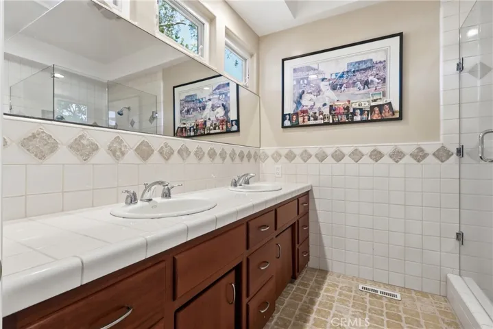 Upper windows provide natural light to office ensuite.