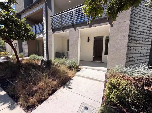 Modern architectural design featuring varied exterior materials including brick and stucco
