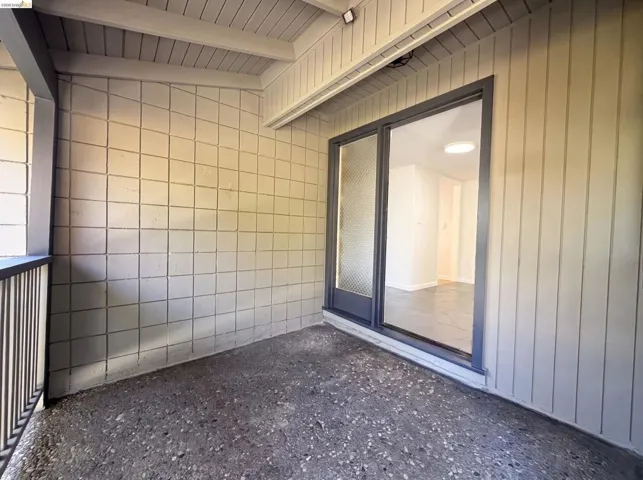 Outdoor patio featuring exposed aggregate flooring