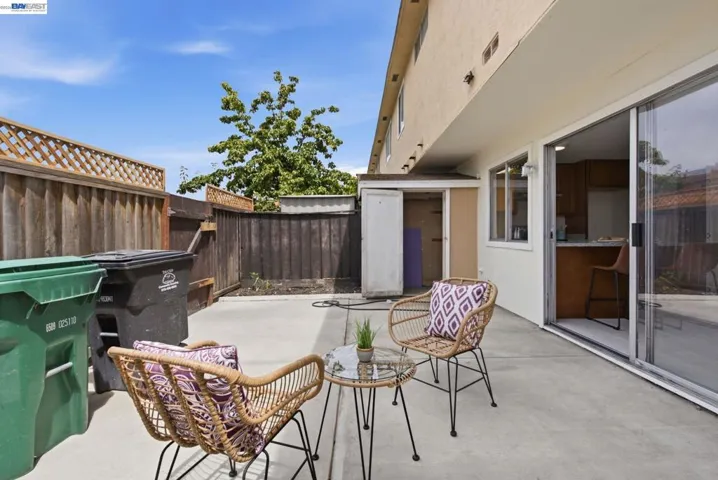 Private outdoor patio space featuring a concrete surface