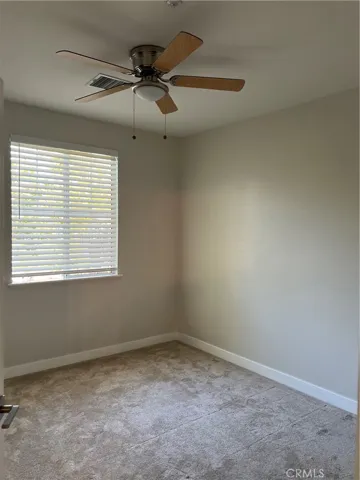 added ceiling fan, newer carpeting and added Blinds