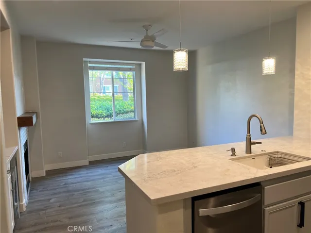 family room with fireplace and wine cooler