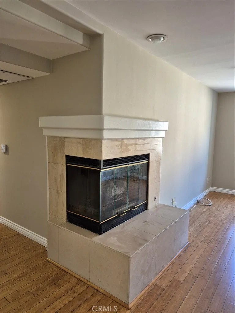 Marble fireplace in airy living room