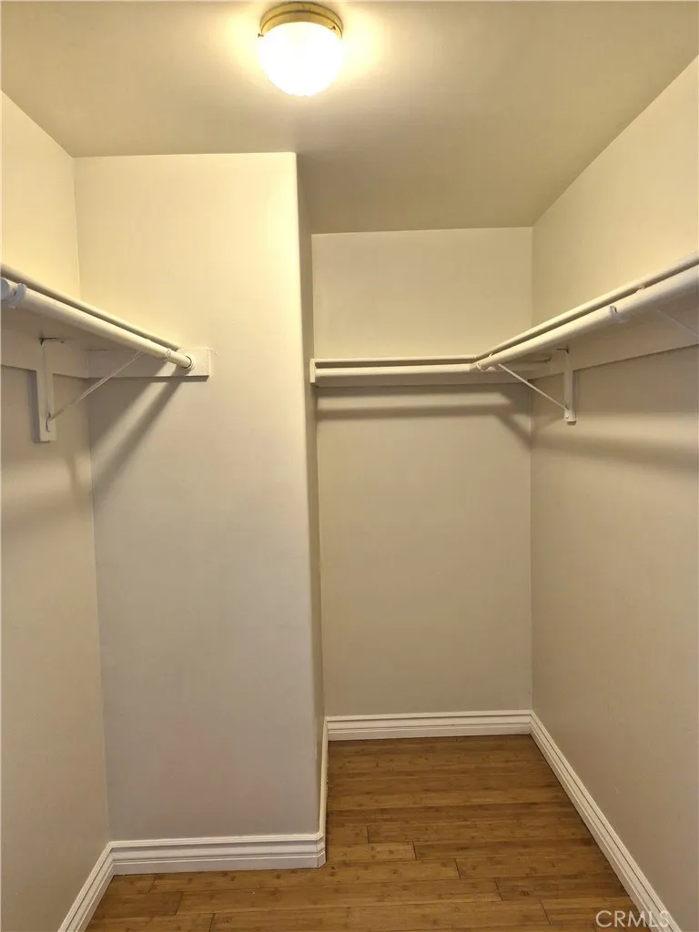 Walking closet in master bedroom