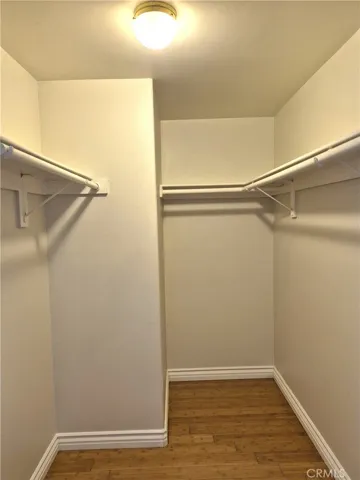 Walking closet in master bedroom