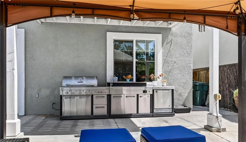 BBQ/outdoor kitchen and gazebo included.