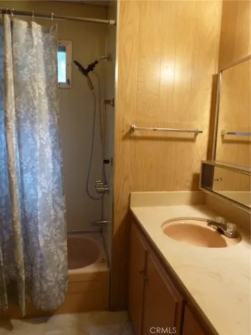 Guest bathroom has tub