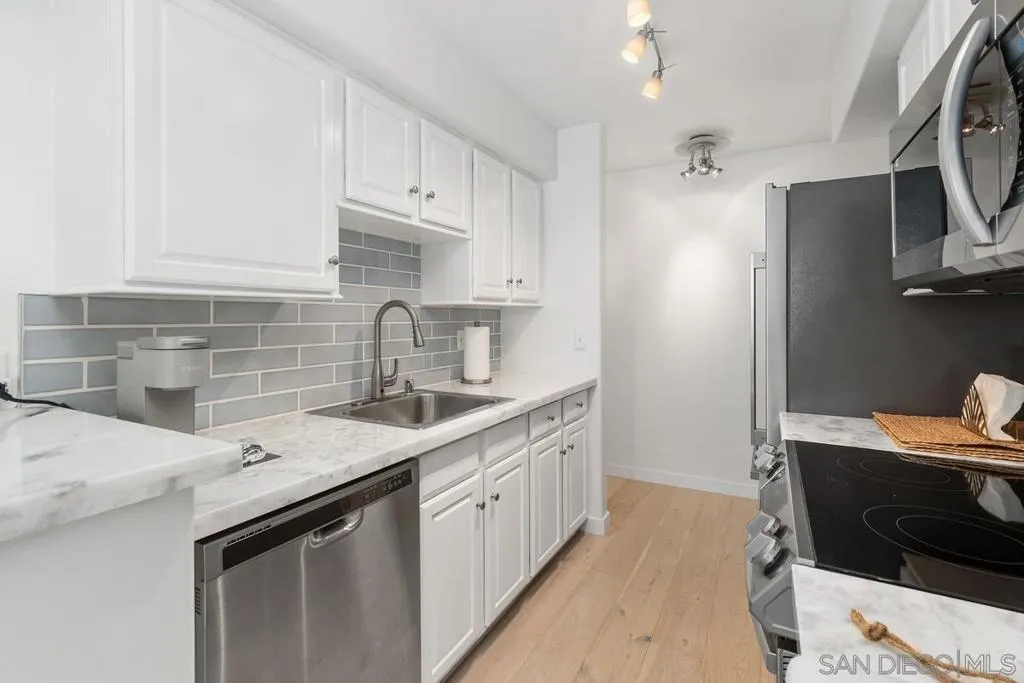 Well equipped kitchen - new appliances, counters, cabinets. Plus all the dishes, glassware, cutlery, etc. convey with the property.