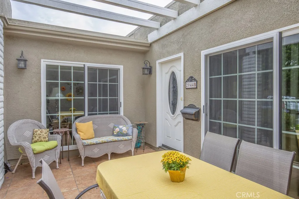 Another view of the front patio and entry to the residence.