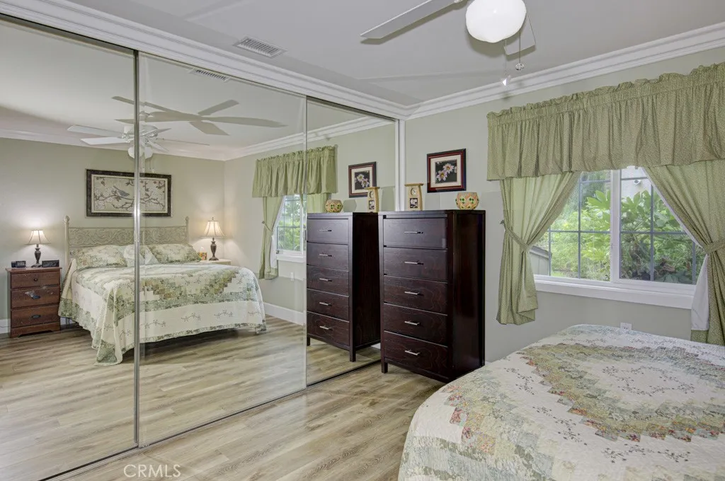 Another view of the primary bedroom suite.