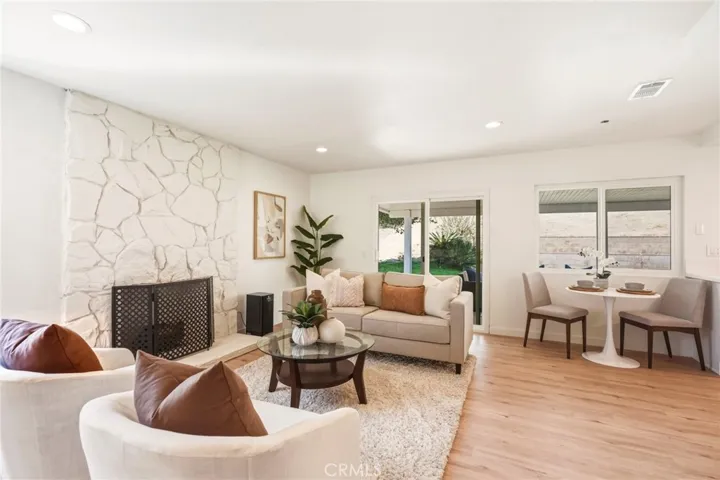 Family room with a stone fireplace