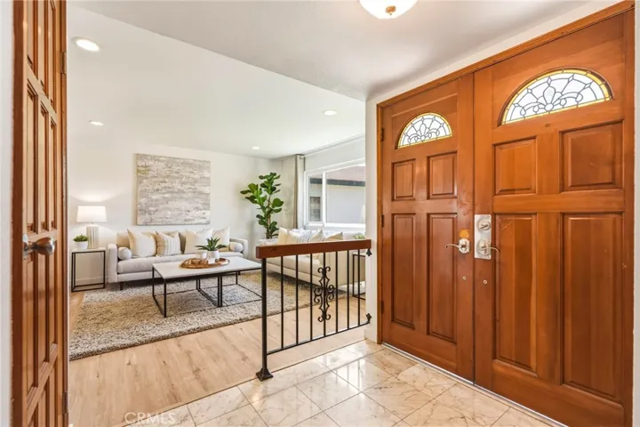 Entry to family room with marble floors