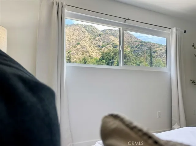 Panoramic mountain views from primary bedroom