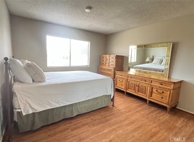This room is exceptionally spacious and features an open, inviting layout that maximizes natural light throughout the space.