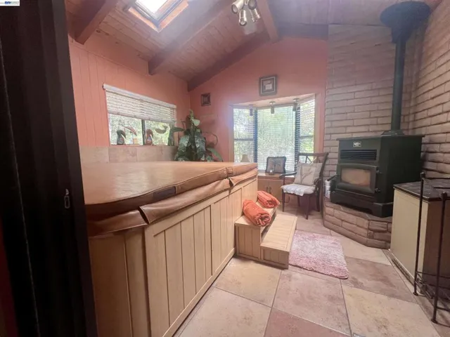 Spa room with pellet stove