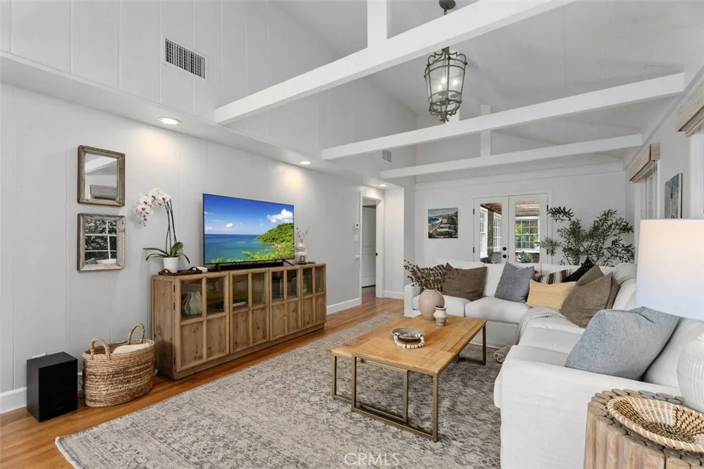 Cozy living room with exposed beams. Cozy living room with exposed beams.