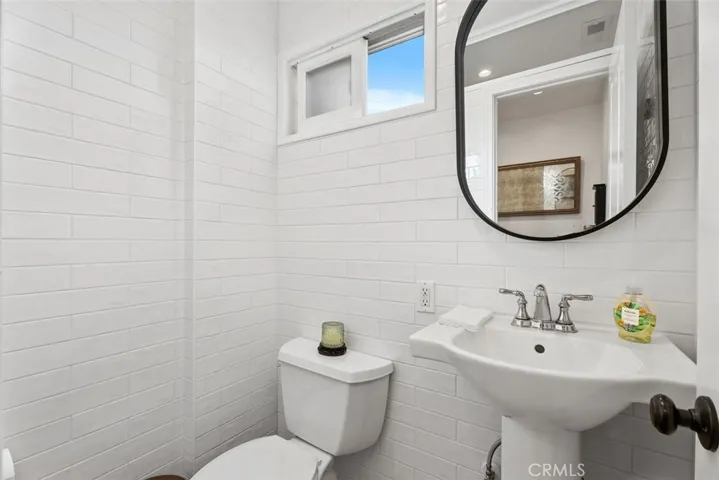 Powder room just off the kitchen.