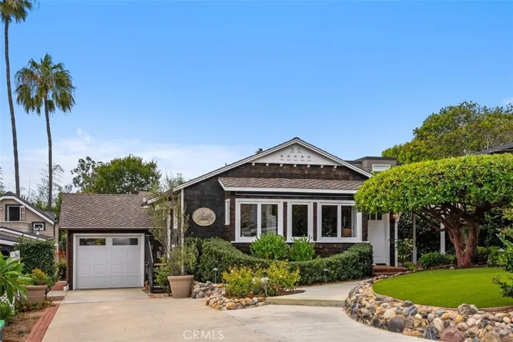 Welcome home to 340 Moss Street in Woods Cove.