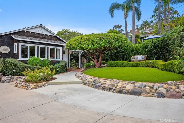 Extra large driveway for a few cars.