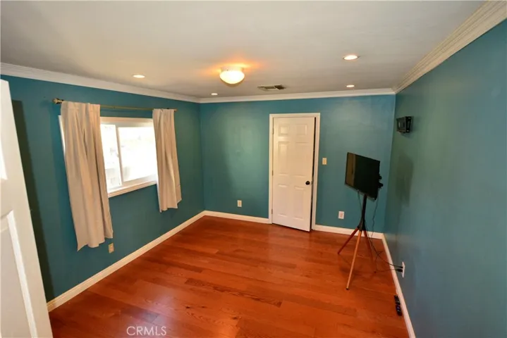 Bedroom number 1 has laminate flooring throughout