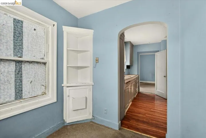 Built-in corner shelving with lower cabinetry