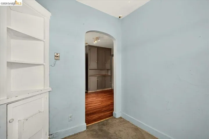Built-in corner shelving with lower cabinetry