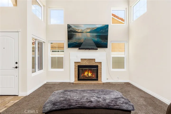 Fireplace & high ceilings in the living room...