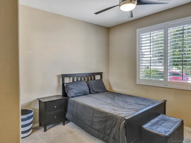 Perfectly set downstairs bedroom adjacent to guest bathroom and entry of house for guests or in laws staying with!