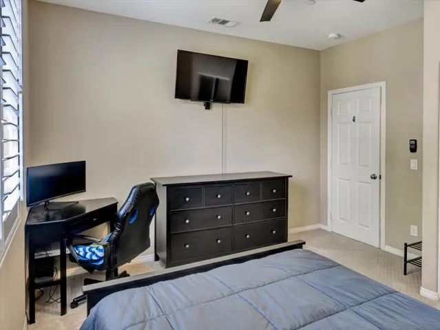 Perfectly set downstairs bedroom adjacent to guest bathroom and entry of house for guests or in laws staying with!