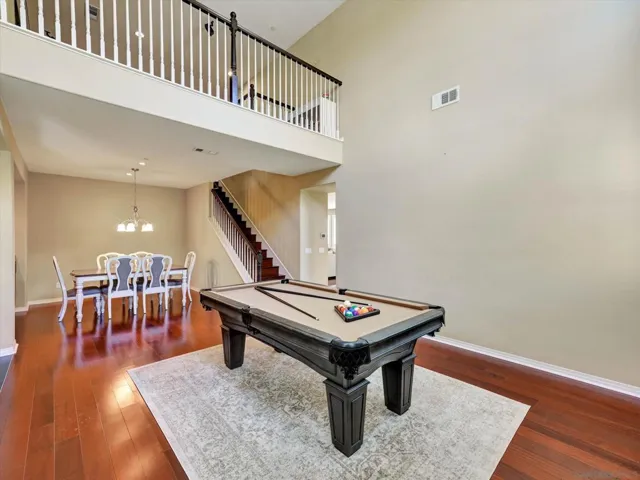 High ceilings absolutely make this living room so stunning!