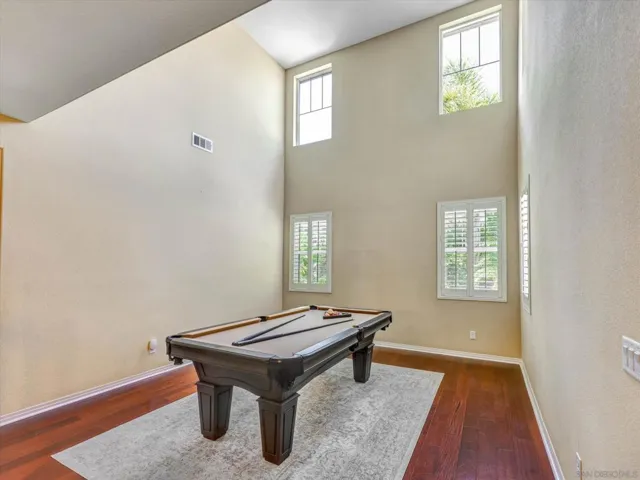 High ceilings absolutely make this living room so stunning!