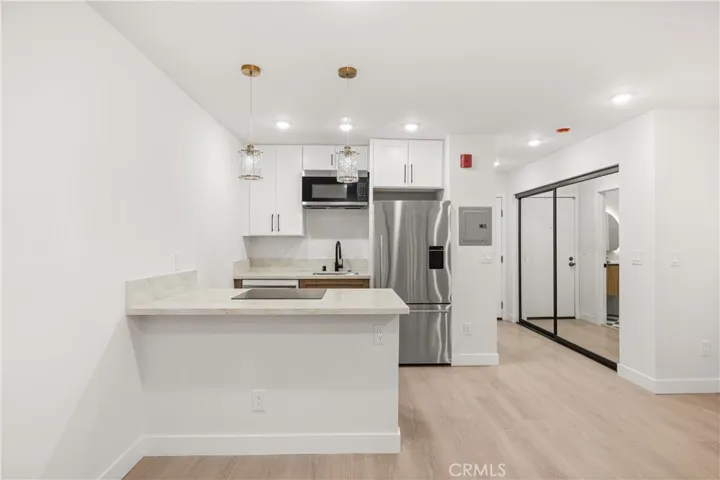 Thoughtfully designed kitchen with stainless steel appliances and contemporary finishes.