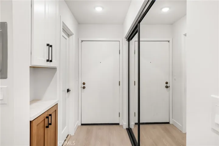 Welcoming entry with built-in storage and generous closet space.
