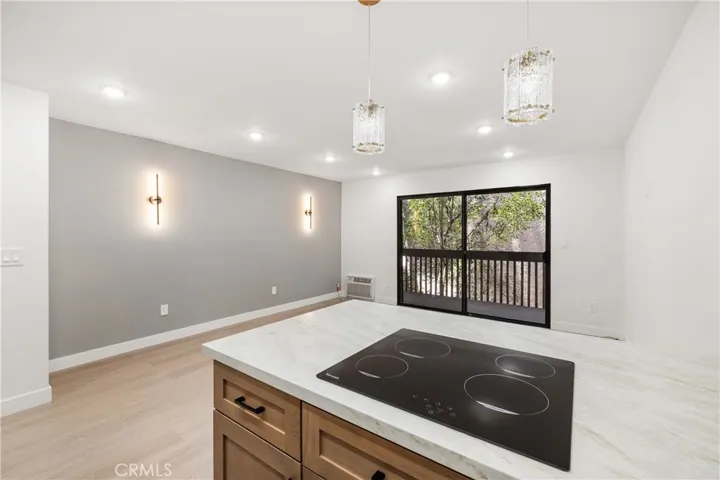 Designer accent wall adds warmth and contemporary style.

