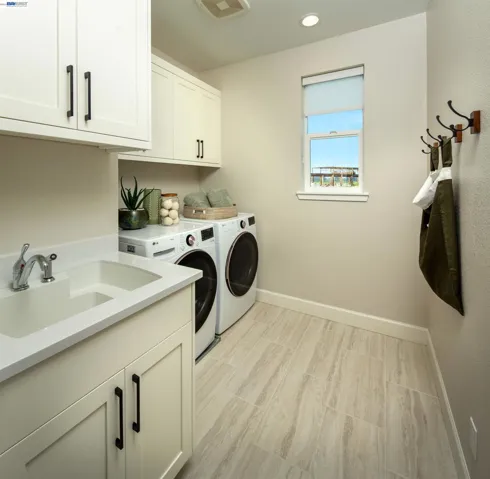 Photo is of the of the model home and not the actual homesite for sale.