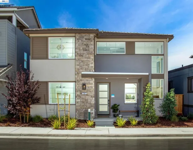 Photo is of the of the model home and not the actual homesite for sale.