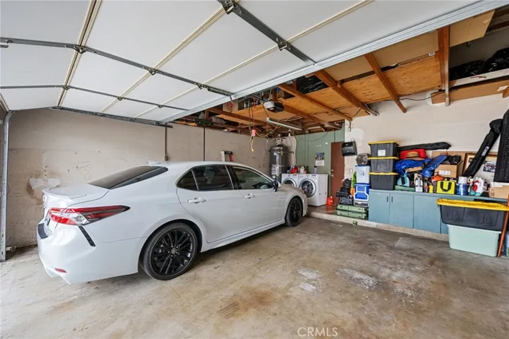 2 car garage for the larger unit with laundry hookups.