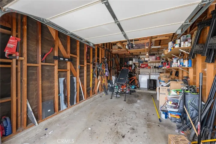 One car garage with laundry for the 2 bedroom side.