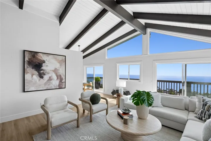 Thoughtfully upgraded by the current owner, the four-bedroom, two-and-a-half-bathroom home welcomes with high ceilings and abundant natural light throughout.