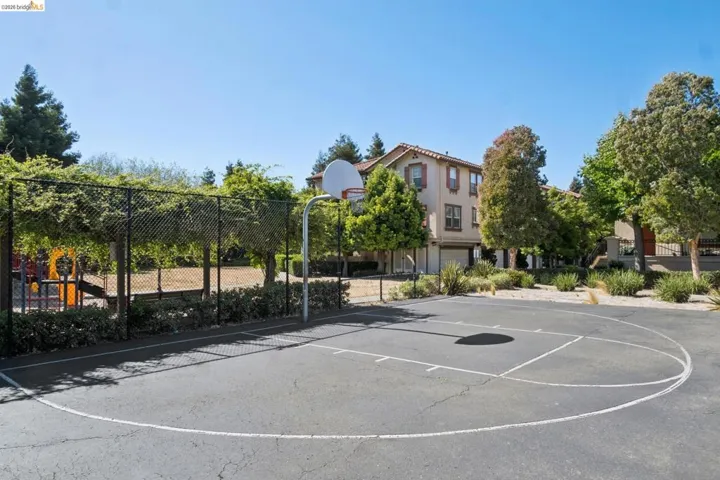Basketball court with asphalt surfacing and painted court lines