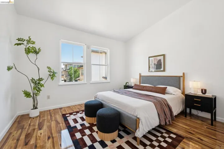 White walls with wood-finish flooring