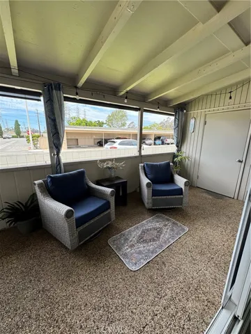 Outside patio with direct view to carport parking space