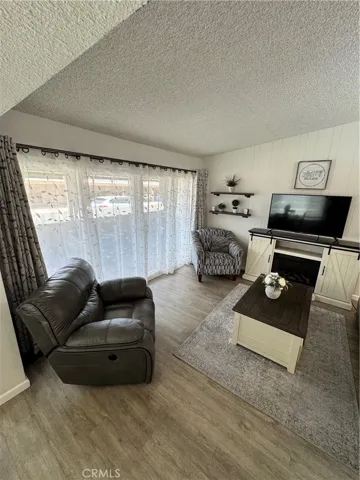 Center Opening Sliding Glass Door with Sheer  Curtains Closed
