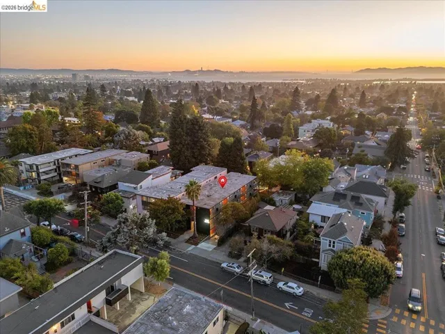 Aerial view of residential area featuring a mountain backdrop