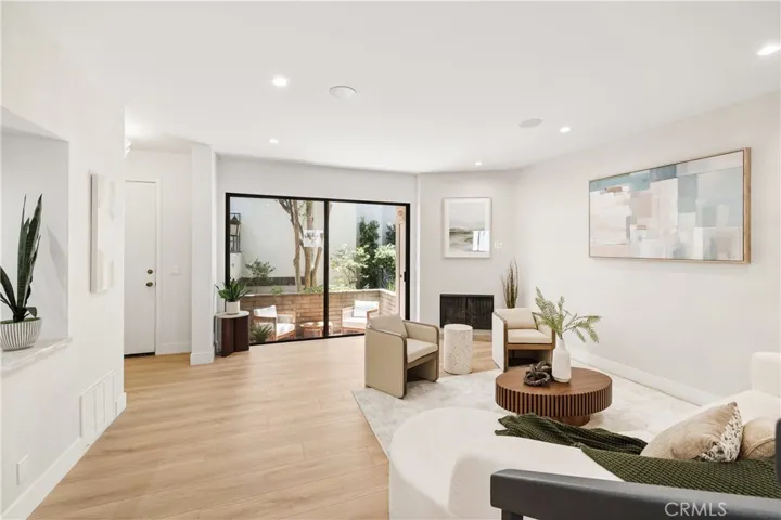 Alternate view of living room & fireplace