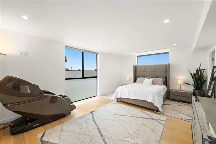 Primary suite serves as a true sanctuary, treating owners to dual "his and hers" walk-in closets.